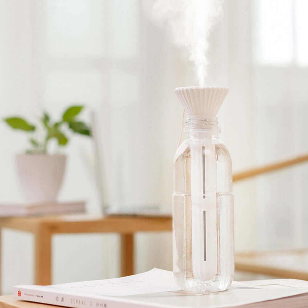 USB ultrasonic humidifierSize: 60x60x206mm
 
 Material: ABS
 
 Operating voltage: 5 V / 1 a
 
 Working current: 250-400ma
 
 Power consumption: 2.0 W
 
 Spray amount: 30-50 ml / hour
 
 Note0My StoreMy StoreUSB ultrasonic humidifier