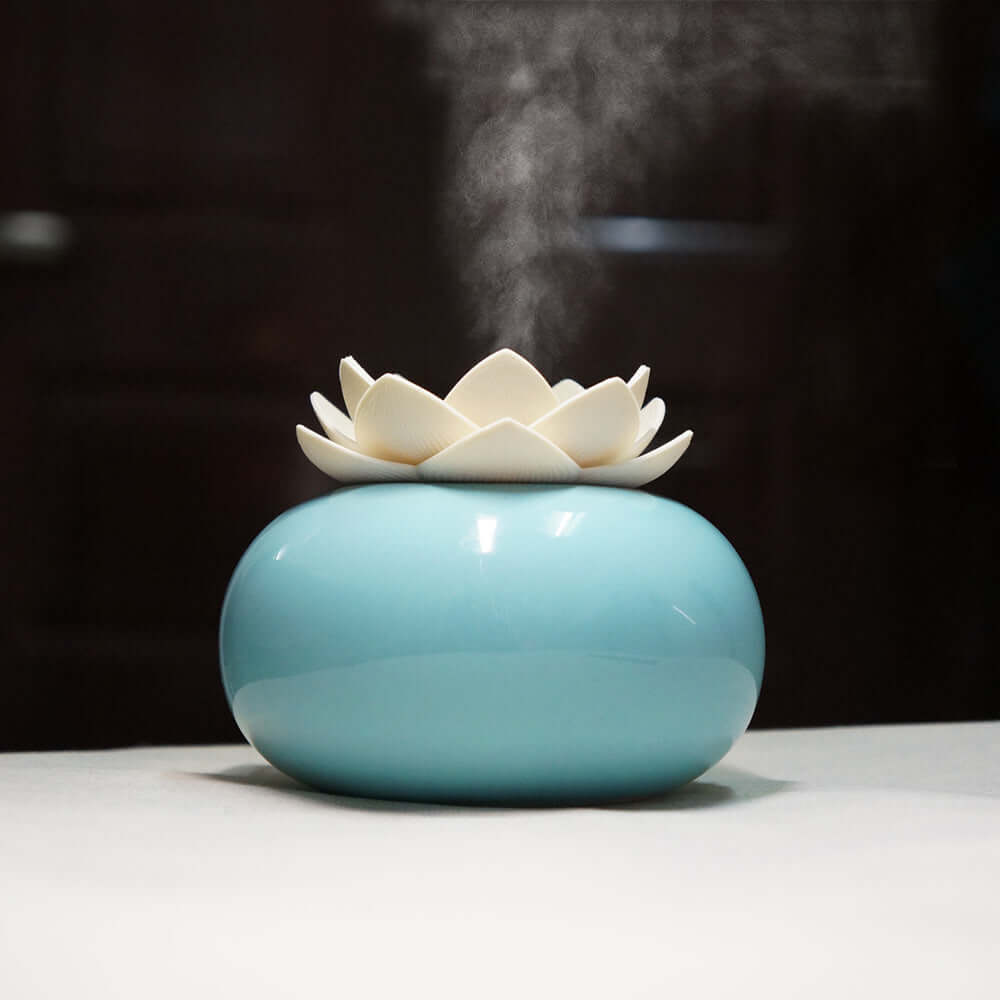 Lotus humidifierProduct name: Lotus aromatherapy humidifier
 
 Material: container one ceramic polishing, lotus one environmental protection PE
 
 Size: 100 * 85MM
 
 Humidification0My StoreMy StoreLotus humidifier