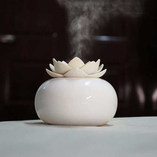 Lotus humidifierProduct name: Lotus aromatherapy humidifier
 
 Material: container one ceramic polishing, lotus one environmental protection PE
 
 Size: 100 * 85MM
 
 Humidification0My StoreMy StoreLotus humidifier