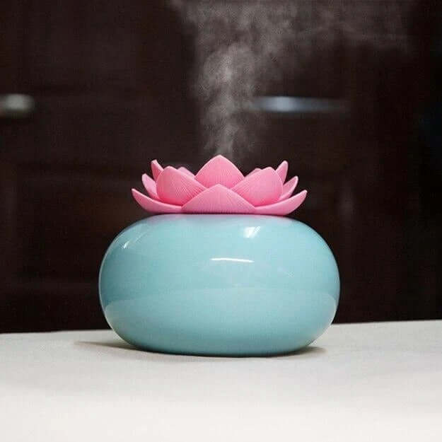 Lotus humidifierProduct name: Lotus aromatherapy humidifier
 
 Material: container one ceramic polishing, lotus one environmental protection PE
 
 Size: 100 * 85MM
 
 Humidification0My StoreMy StoreLotus humidifier